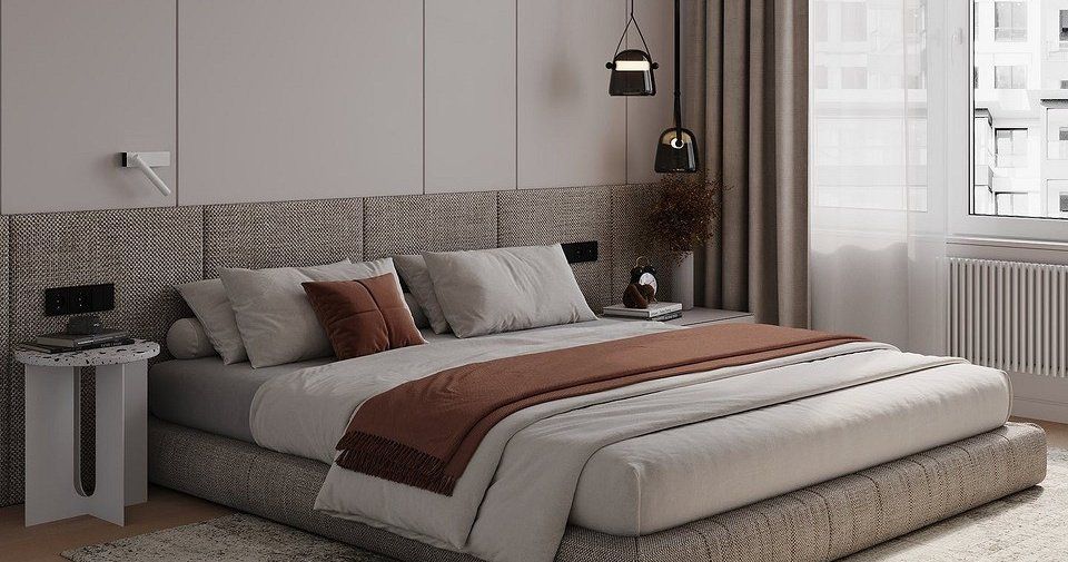 Кровать в спальне в минималистичном стиле